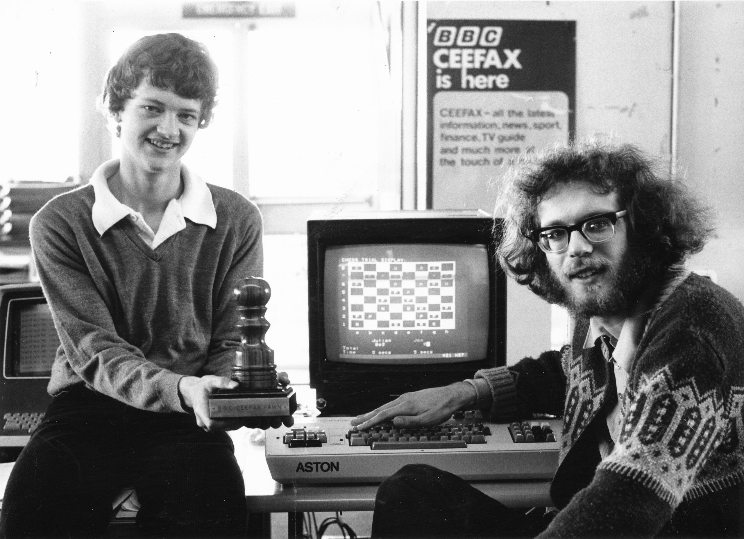 Julian Hodgson and Jonathan Speelman prepare to play each other at their own home via CEEEFAX. This was organised by Peter Andrews of BBC Chess Club and was the first match of its kind.