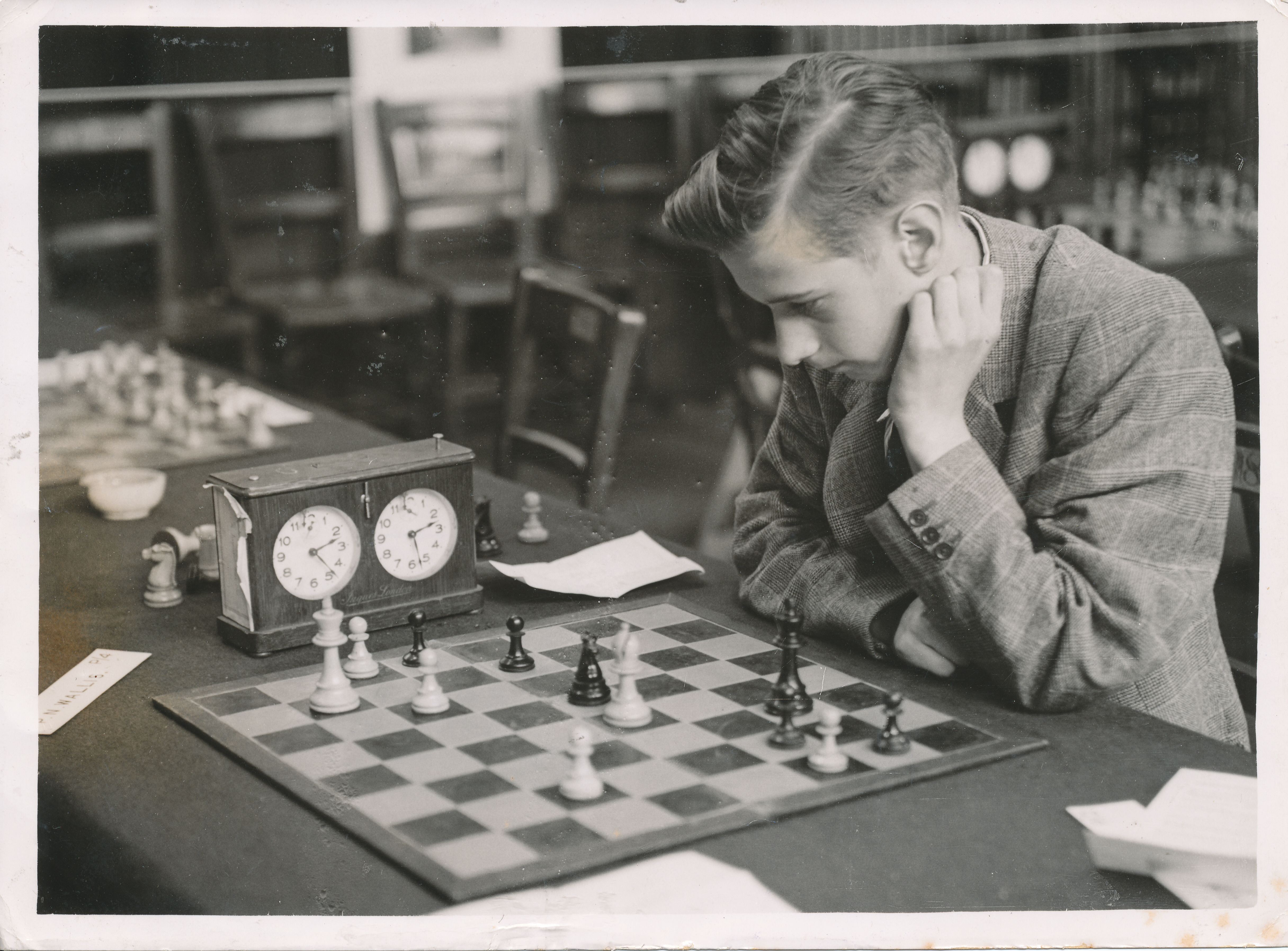 Boy Chess Champion. New York Times photo shows 14 year old J. Penrose 14 year old by chess champion of Britain, in play at the British Chess Championships at Bishopsgate Institute today. He has had great success in the tournament so far, beating men far above his age and experience. 2nd September 1948. Photograph by Reginald Webster