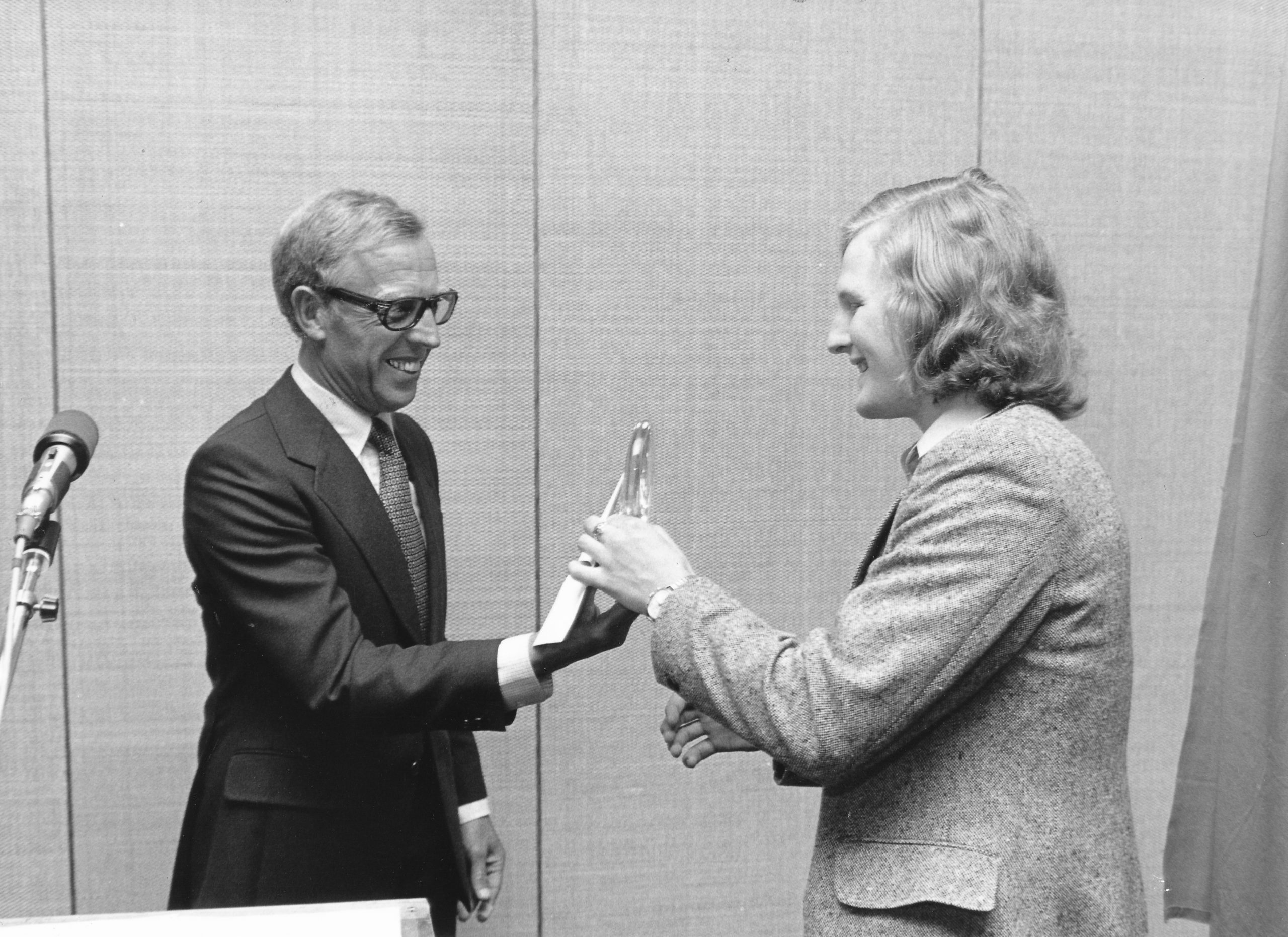 Tony being presented with the trophy in the photograph below