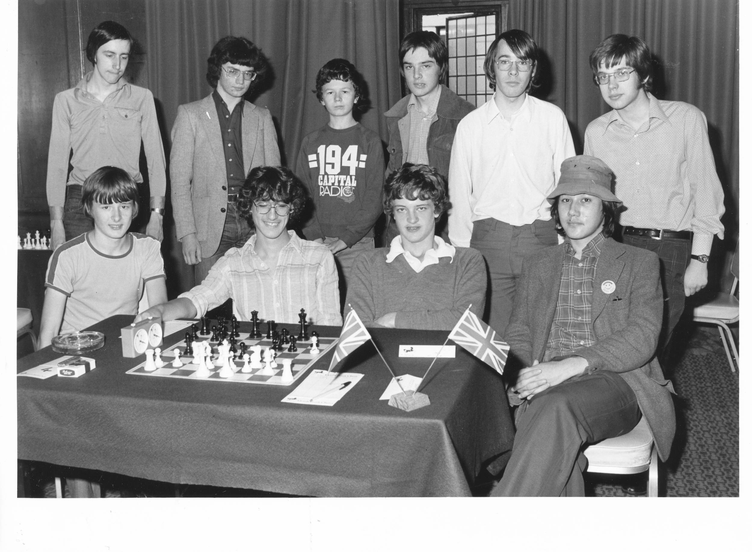 IM Byron Jacobs (standing, second from left)) at a Lloyds Bank Masters