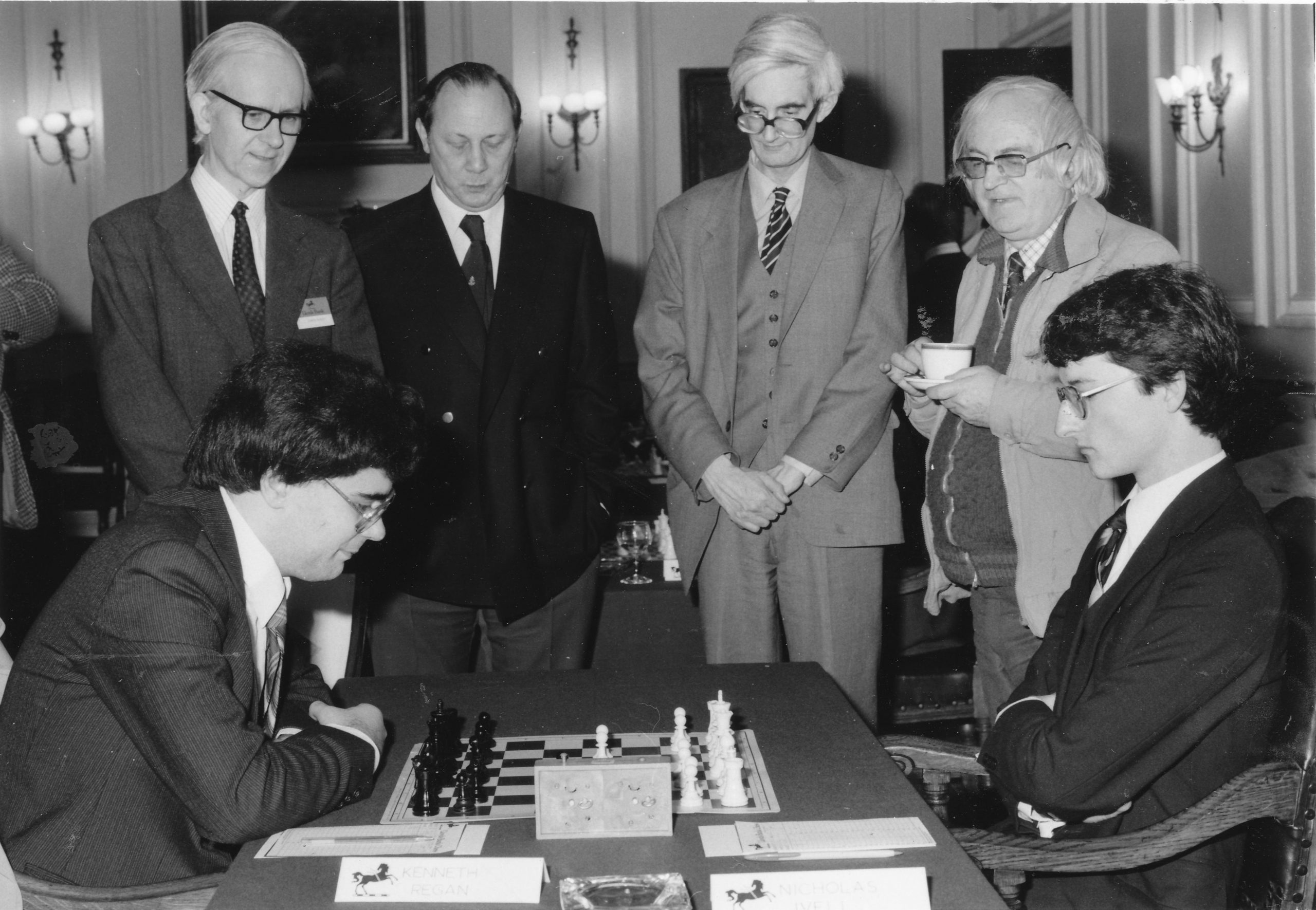 Leonard Barden, Henry Mutkin, Adrian Hollis and Bob Wade observe Nick Ivell vs Ken Regan at the 1983 Varsity match